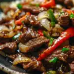 Sizzling Chinese Pepper Steak with Onions
