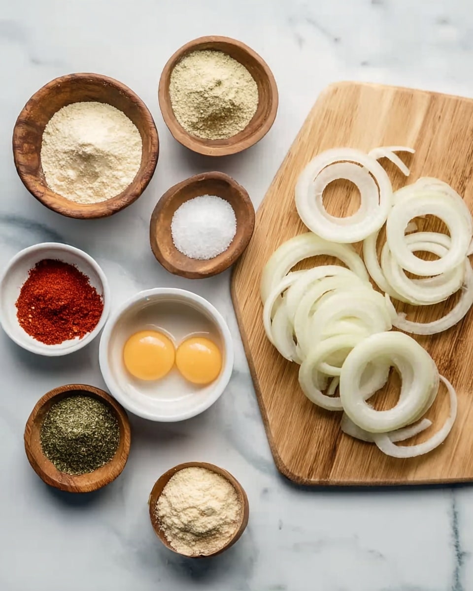 The image shows a top view of various ingredients arranged on a white marbled surface. On the right side, a wooden cutting board holds several white onion rings stacked loosely. Surrounding the cutting board are small white and wooden bowls containing different spices and powders: a white bowl with two raw eggs in the center, a white bowl with a pale powder above it, a wooden bowl with red spice and salt at the bottom left, a wooden bowl with green herbs below it, and two white bowls with pale powders at the top and bottom right. The spices and powders vary in color from white and cream to red and green, and the setup is neat and organized. Photo taken with an iphone --ar 4:5 --v 7