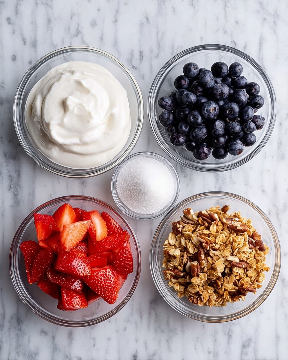 The image shows five clear glass bowls arranged on a white marbled surface. The middle bowl contains bright red sliced strawberries with a shiny texture. To the top right, there is a bowl filled with whole dark blue blueberries, smooth and round. On the bottom right, a bowl holds golden-brown granola with nuts mixed in, showing a crunchy texture. The top left bowl contains thick white yogurt with a creamy, smooth surface, and the bottom left bowl has white granulated sugar, fine and powdery. photo taken with an iphone --ar 4:5 --v 7