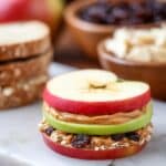 Apple Sandwiches with Peanut Butter, Raisins, and Toasted Oats Recipe