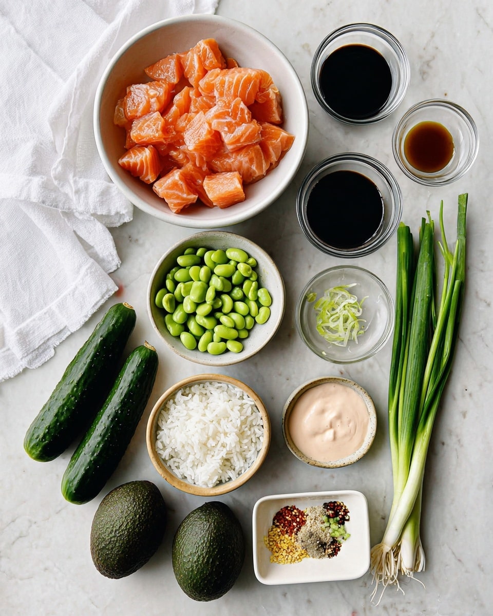The image shows various raw ingredients neatly arranged on a white marbled surface. In the top left, there is a white bowl filled with thick, orange-pink chunks of raw salmon. To its right, small glass bowls hold dark soy sauce, light vinegar, finely minced garlic, and grated ginger. Below these, a beige bowl contains sticky white rice. Around the bowls are fresh vegetables: two whole dark green cucumbers, two dark green avocados, bright green edamame beans in a white bowl, and a bunch of green onions with white stalks. A small white dish with a colorful spice mix and a small white bowl filled with a creamy pink sauce are placed near the front. A woman's hand is not visible here, but a white cloth napkin is draped to the left. The overall setup is clean and bright, photographed with an iphone --ar 4:5 --v 7