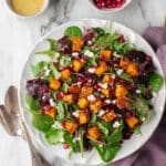 Spiced Roasted Butternut Squash Salad with Pomegranate, Goat Cheese, and Date Dressing Recipe