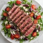 Grilled Steak Salad with Arugula, Tomatoes, Kalamata Olives, and Goat Cheese Recipe