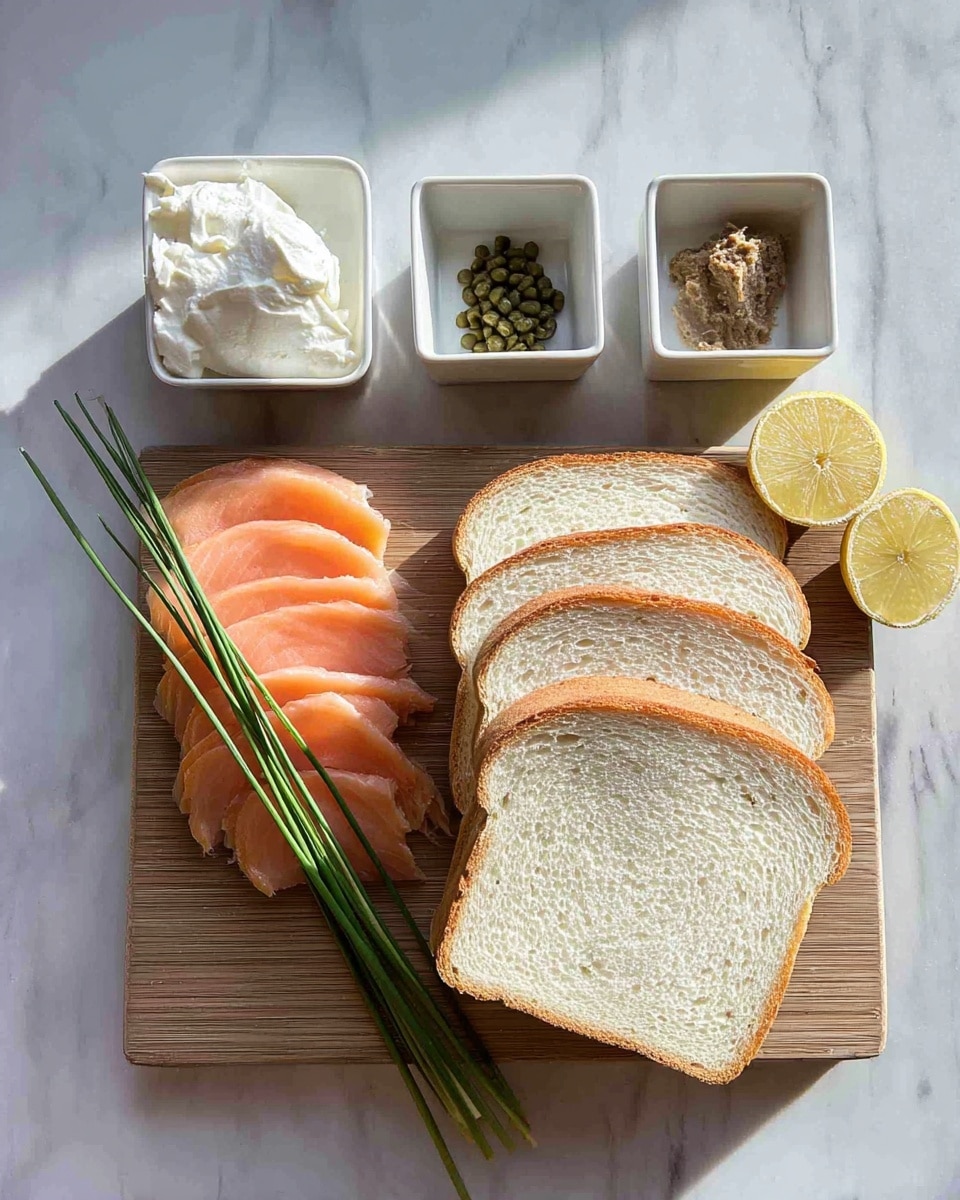 The image shows a wood cutting board on a white marbled surface with three slices of white bread on the right side, where the bread has a soft texture and light golden edges. To the left of the bread, there are thin layers of smoked salmon that have a smooth, slightly shiny texture with a pink-orange color. A few long green chives lay diagonally over the salmon, adding a fresh touch. Above the cutting board, three small white square dishes hold different ingredients: one with a dollop of white cream cheese in soft peaks on the left, one with green capers in the middle, and one with a brown anchovy paste on the right. To the far right, there is a halved lemon showing its bright yellow interior. The photo has natural light and a clean, simple look photo taken with an iphone --ar 4:5 --v 7