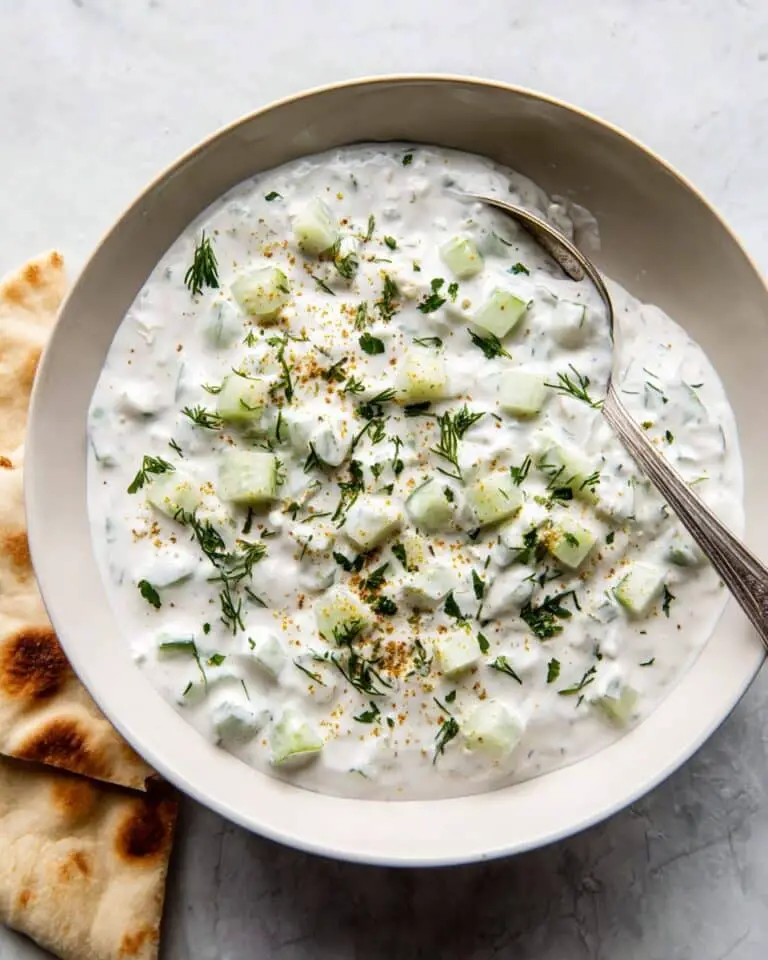 Easy Raita Recipe with Greek Yogurt, Cucumber, and Spices Recipe