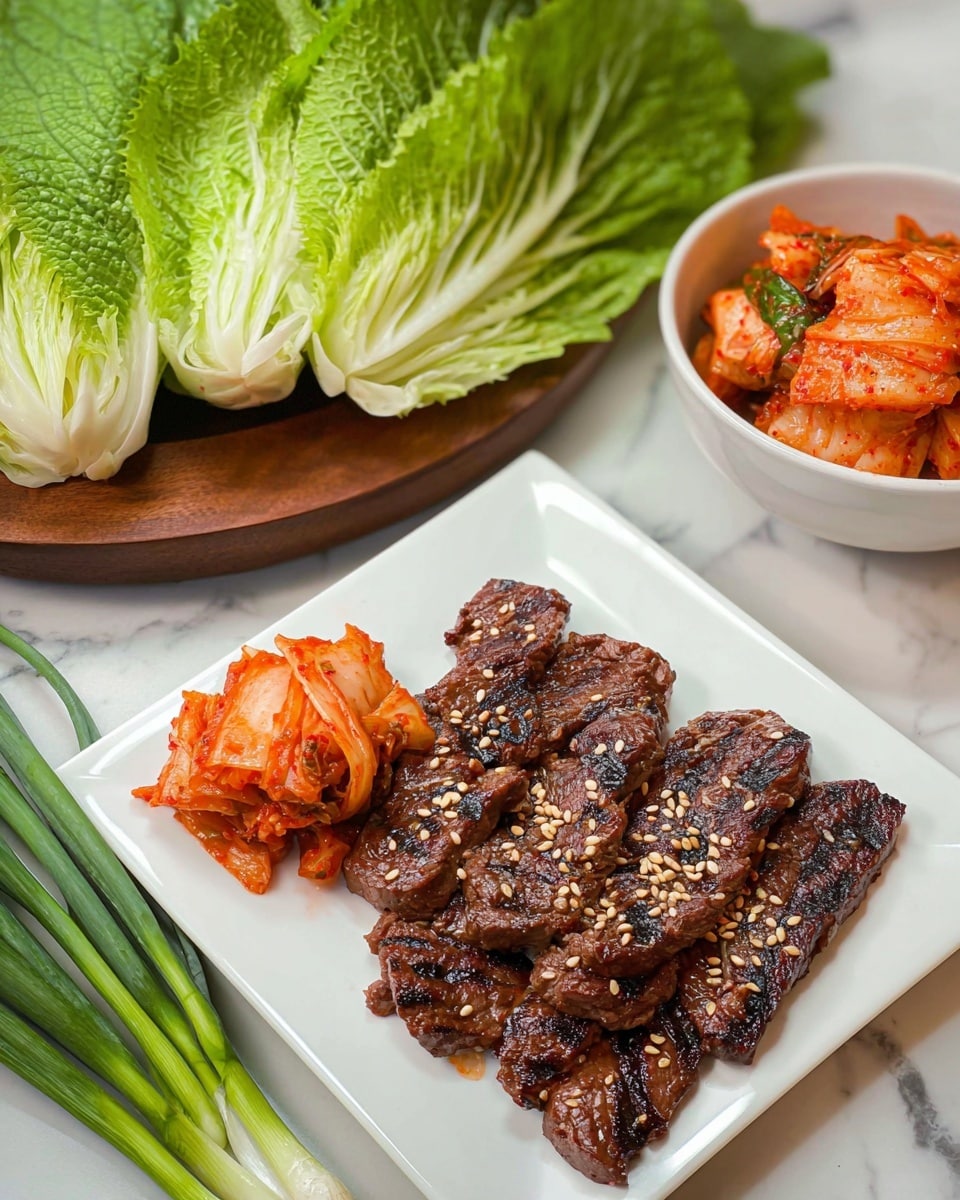 The image shows a white square plate with several dark brown grilled meat pieces arranged closely side by side, sprinkled with light tan sesame seeds. To the left on the plate, there is a small portion of bright orange-red kimchi with a glossy texture and layered napa cabbage pieces visible. Behind the plate, on a wooden round dish, there are fresh, bright green lettuce and perilla leaves stacked in layers, showing the veins and texture of each leaf. On the top right, a white bowl holds more bright orange-red kimchi. In the bottom left corner of the image, several long green onions lay diagonally on a white marbled surface. Photo taken with an iphone --ar 4:5 --v 7