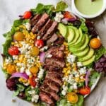 Grilled Flank Steak Salad with Avocado, Corn, and Cilantro Lime Dressing Recipe