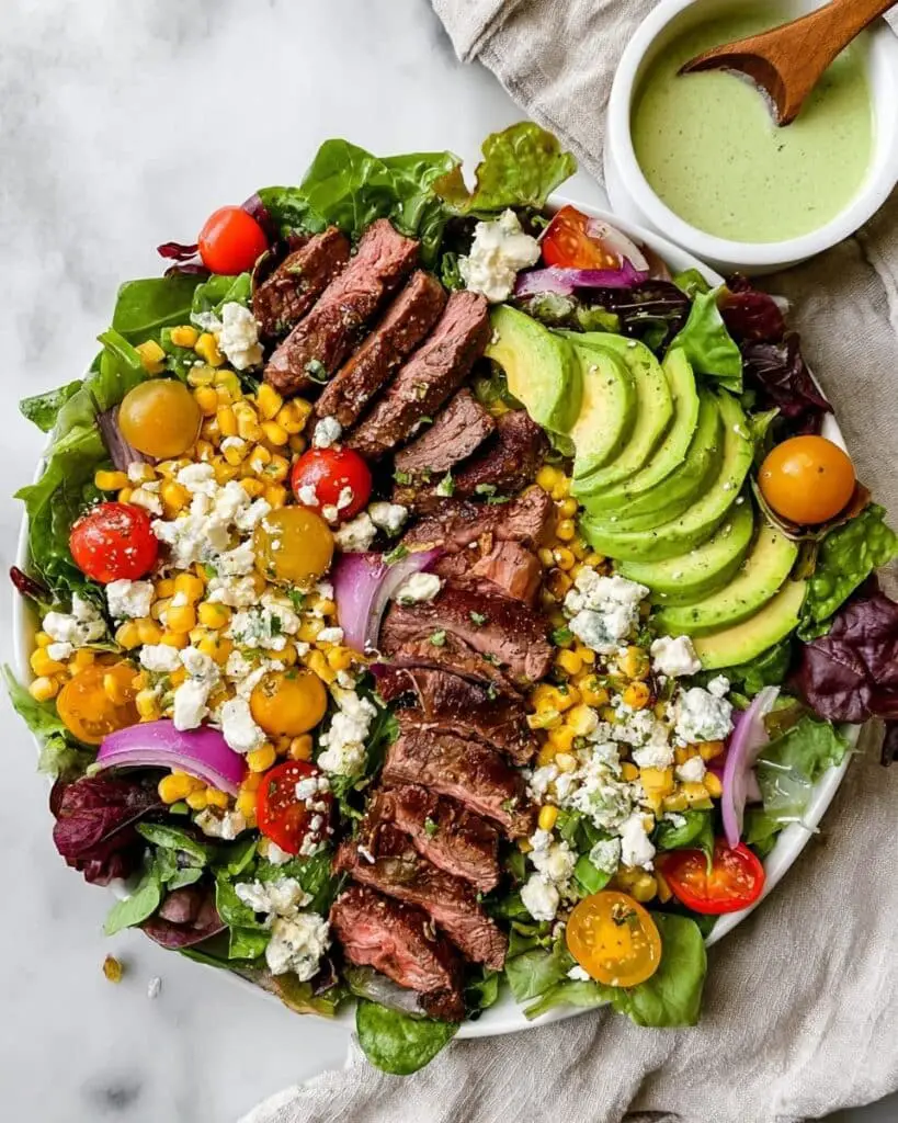 Grilled Flank Steak Salad with Avocado, Corn, and Cilantro Lime Dressing Recipe