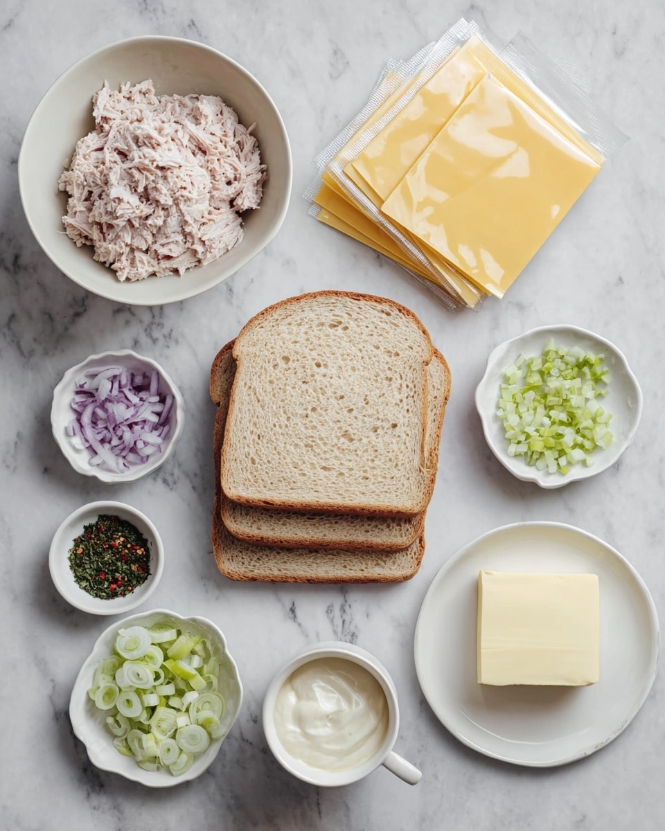 The image shows ingredients arranged on a white marbled surface, ready to make a sandwich. At the center, there are four slices of light brown bread stacked slightly unevenly. Above the bread, on the left, a white bowl holds light pink shredded tuna, and near it, another bowl contains creamy white mayonnaise. To the right, there are three packages of yellow cheese slices, still wrapped, and a small white bowl filled with coarse salt and pepper. Below the bread, a small white plate has finely chopped light green celery and purple onions side by side. Next to it, a small bowl has dark green chopped herbs. Below that, there is a tiny white bowl with red chili flakes. To the right, a small white plate holds a square of pale yellow butter, and beside it, an empty white cup finishes the set. photo taken with an iphone --ar 4:5 --v 7