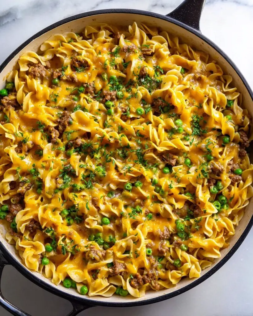 Ground Beef Stroganoff with Cheddar and Peas Recipe