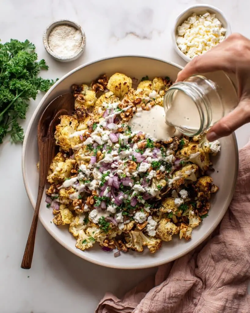 Roasted Cauliflower Salad with Dates, Feta, and Tahini Dressing Recipe