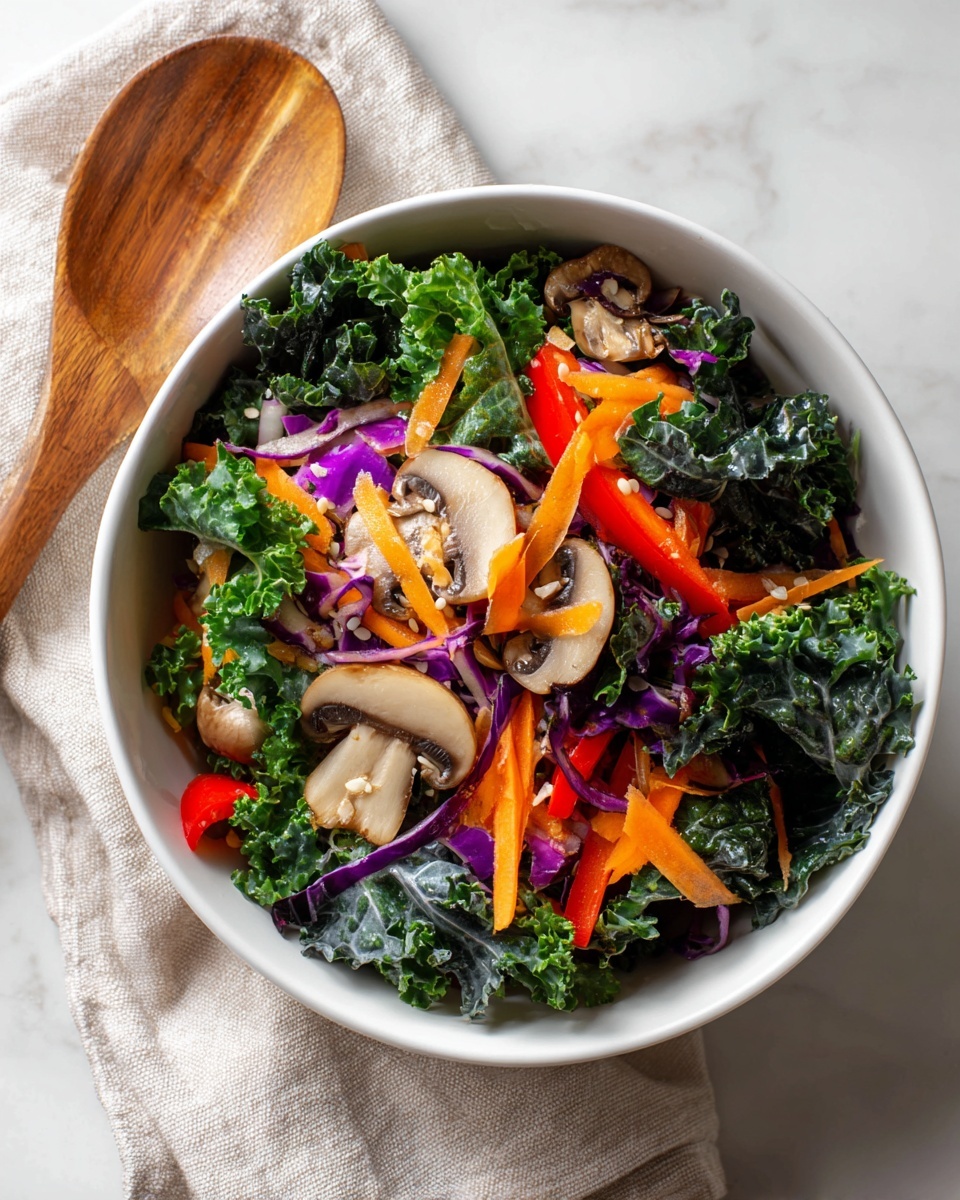 A white bowl filled with a mixed salad showing several layers: the bottom layer consists of dark green kale leaves with a slightly wrinkled texture, topped with thin orange carrot strips and red bell pepper slices. Mixed within are round slices of light brown mushrooms and small bits of purple cabbage. The salad looks fresh and colorful with a few small seeds sprinkled on top. The bowl sits on a white marbled surface next to a light beige cloth napkin with a wooden spoon placed on it. Photo taken with an iphone --ar 4:5 --v 7