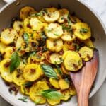 Golden Sautéed Summer Squash with Toasted Almonds, Golden Raisins, and Lemon Recipe