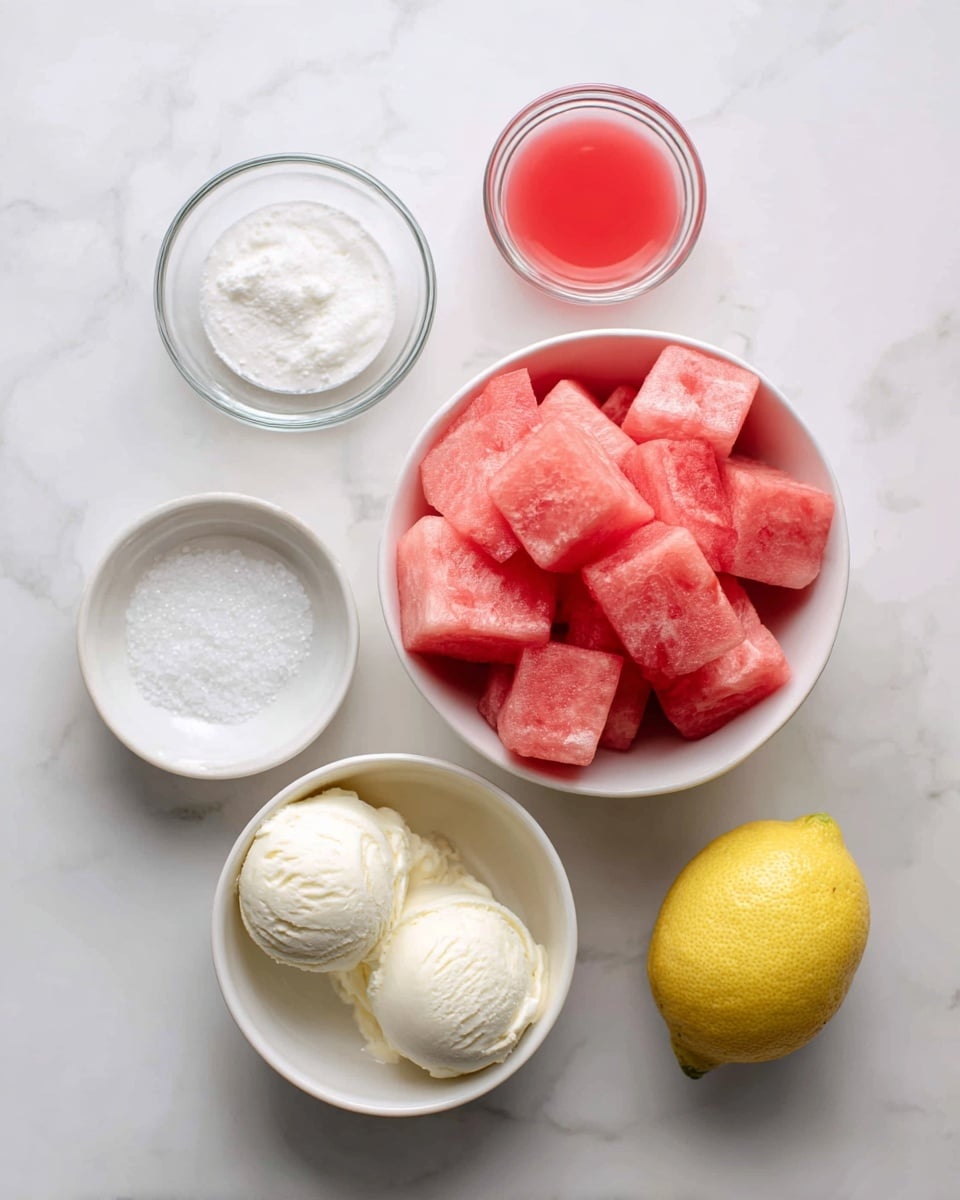 The image shows a top view of six ingredients arranged on a white marbled surface. In the center is a white bowl filled with frozen bright pink watermelon cubes. To the bottom left is a white bowl with two scoops of smooth, creamy white vanilla ice cream. Above it is a small white bowl containing fine white sugar. To the top right of the watermelon is a white bowl with bright red liquid, possibly juice. Below it is a small clear glass bowl with coarse white salt. On the far right is a whole fresh yellow lemon with a small green stem. The items are spaced evenly and lit softly, creating a clean and fresh look photo taken with an iphone --ar 4:5 --v 7